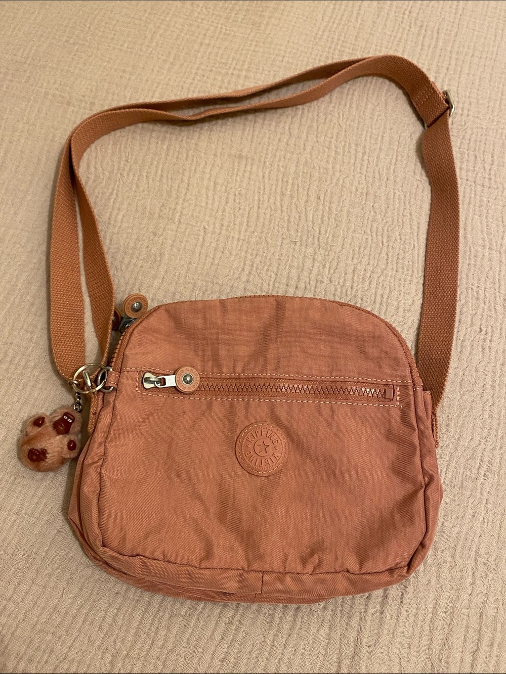 Kipling Dusty Terracotta Crossbody Bag with Signature Monkey Charm